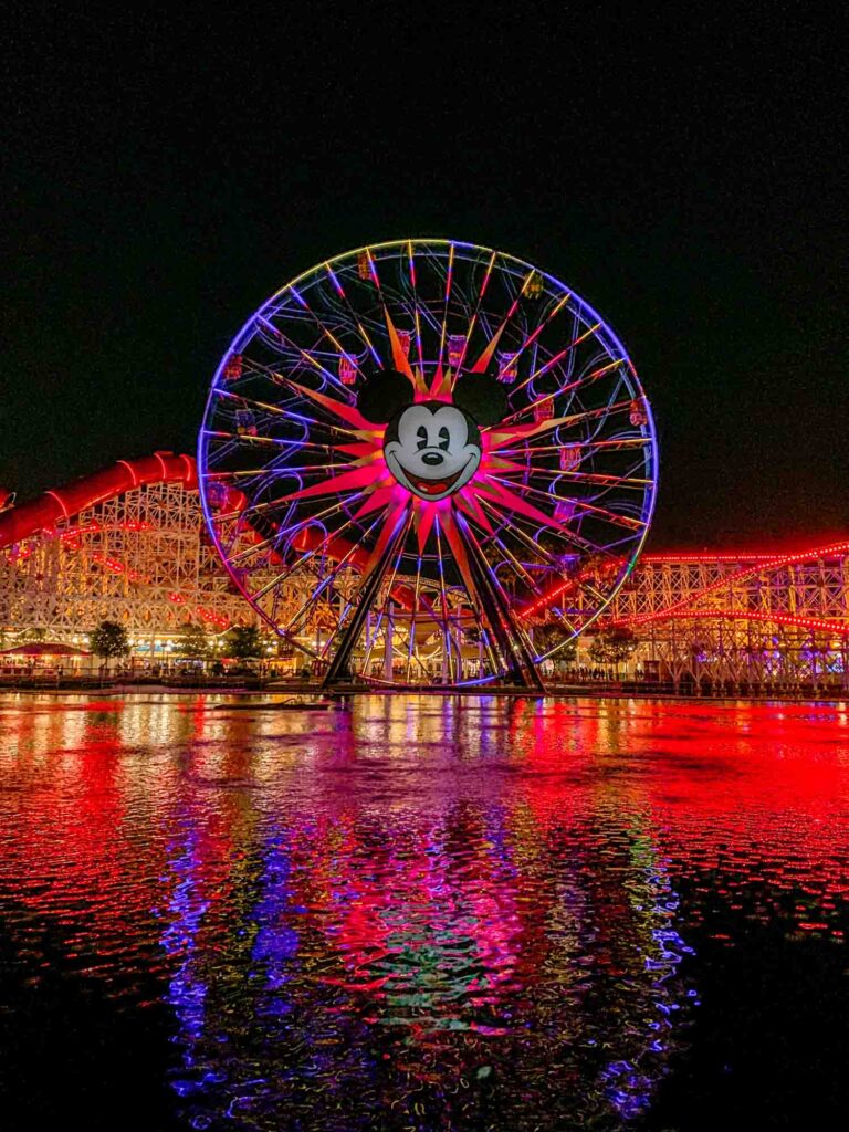 pixar pier lit up at night